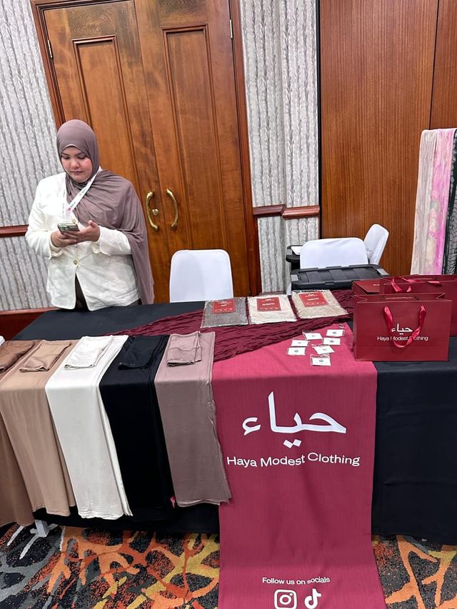 Haya Modest Clothing’s table at the Urban Pop Ups Pop Up for Palestine fundraiser dinner in Perth